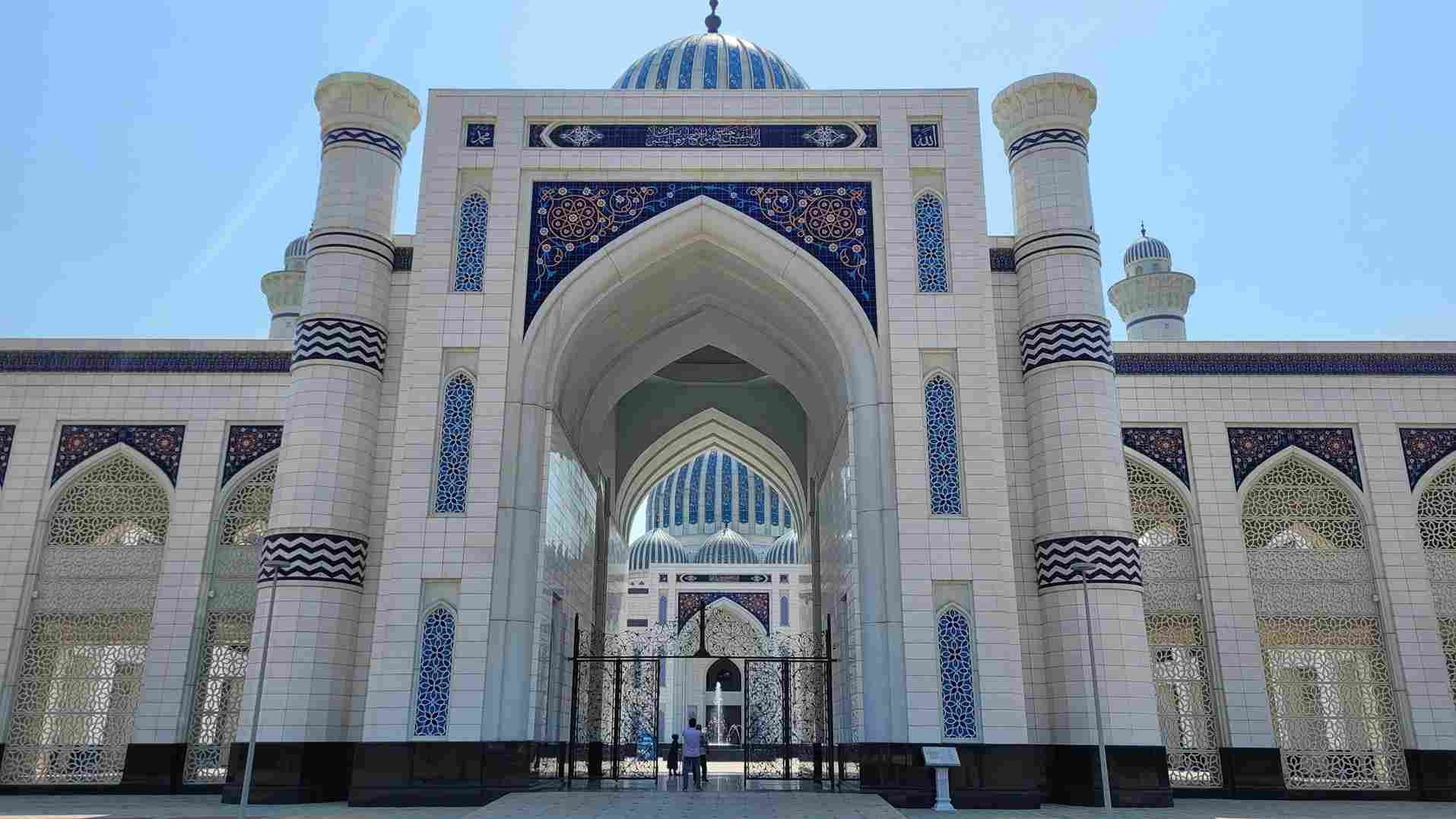 Grand mosque ornate gate arch blue dome Islamic tile Dushanbe Tajikistan